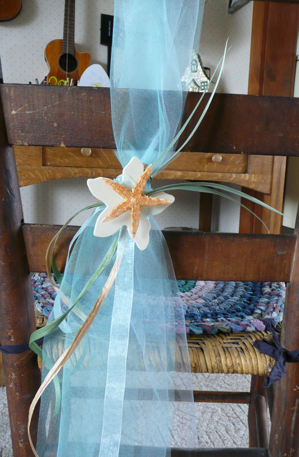 beach wedding chair sash We alternated different shades of blue and green 